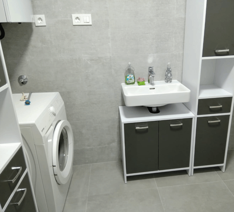 older man having his hair blow dried